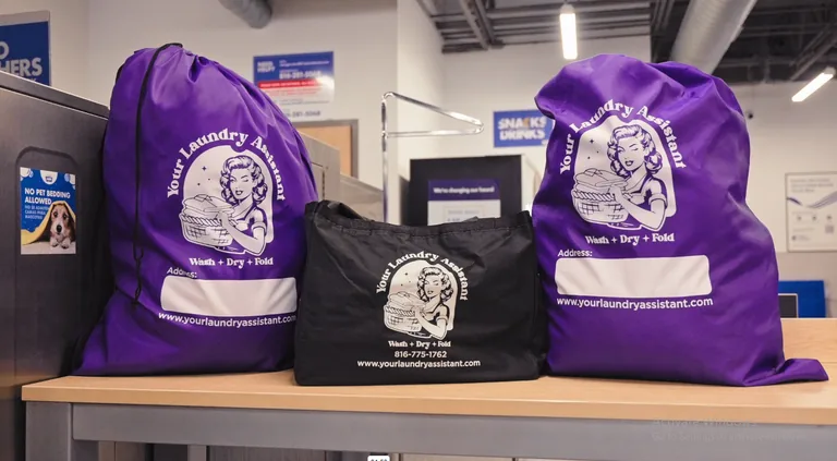 Your Laundry Assistant branded laundry bags ready for pickup